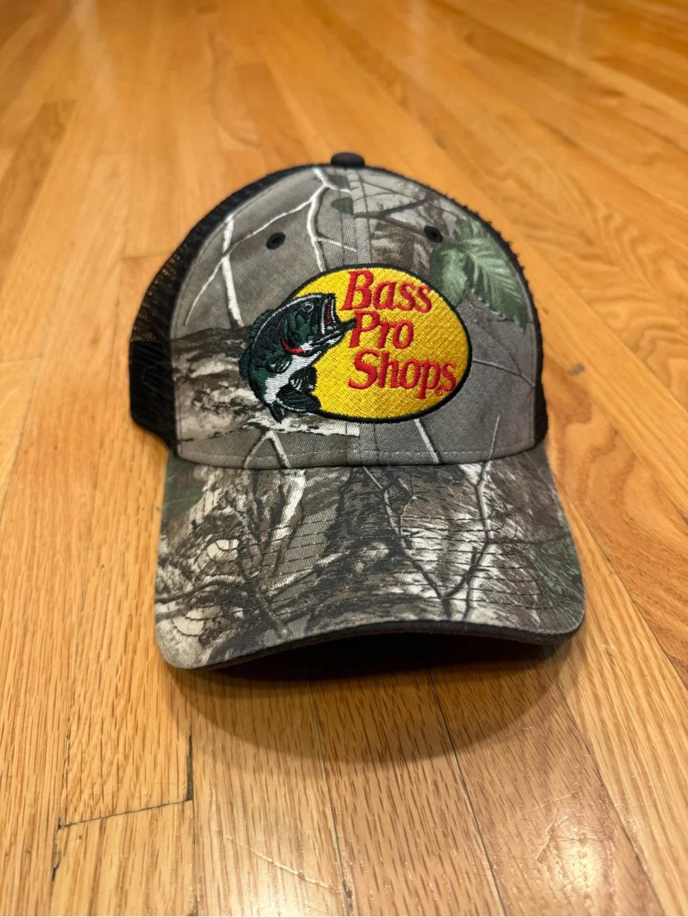 Bass Camo Trucker Hat with Yellow Logo